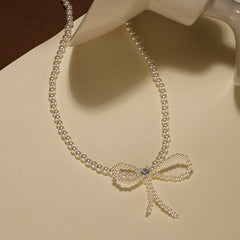 Delicate Bow Pearl Pendant Necklace